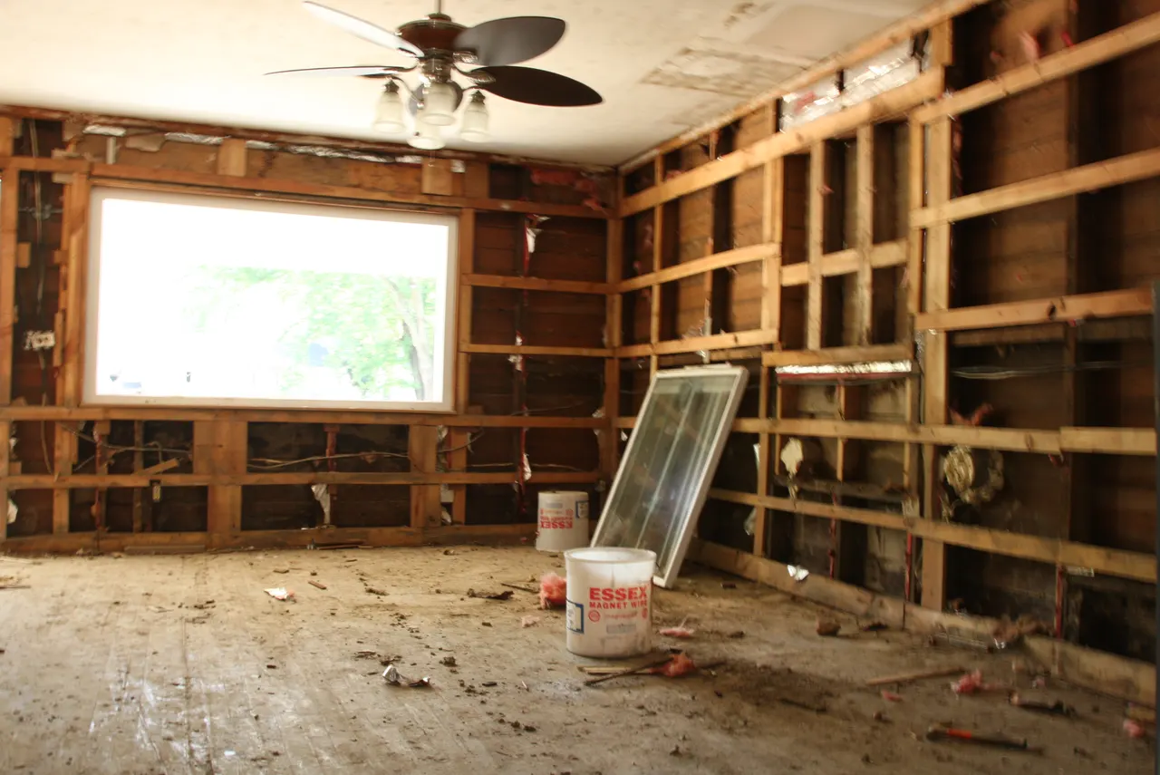 Exposed interior framing after damaged wall finishes were removed